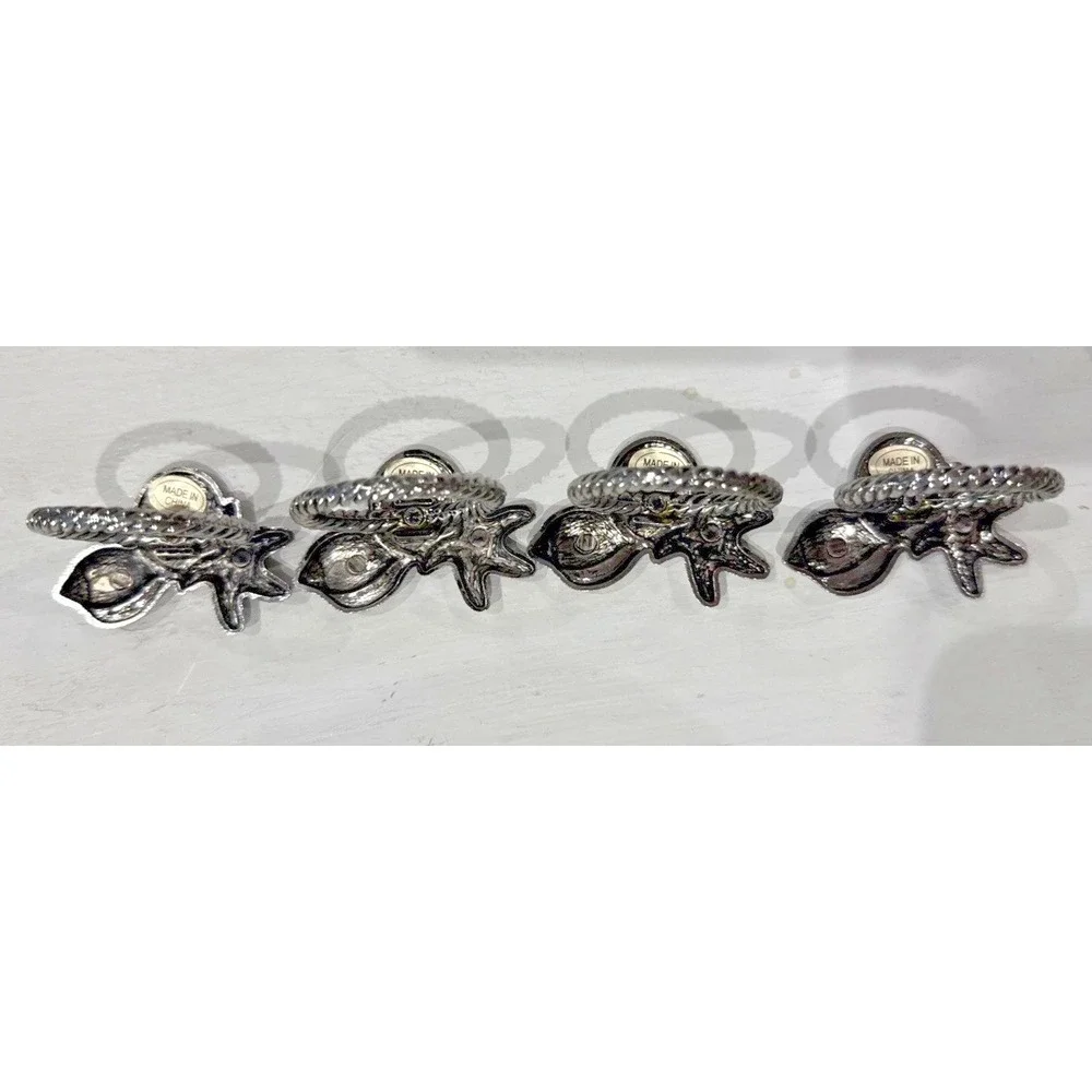 vintage silver-toned napkin rings Figuring Seashells